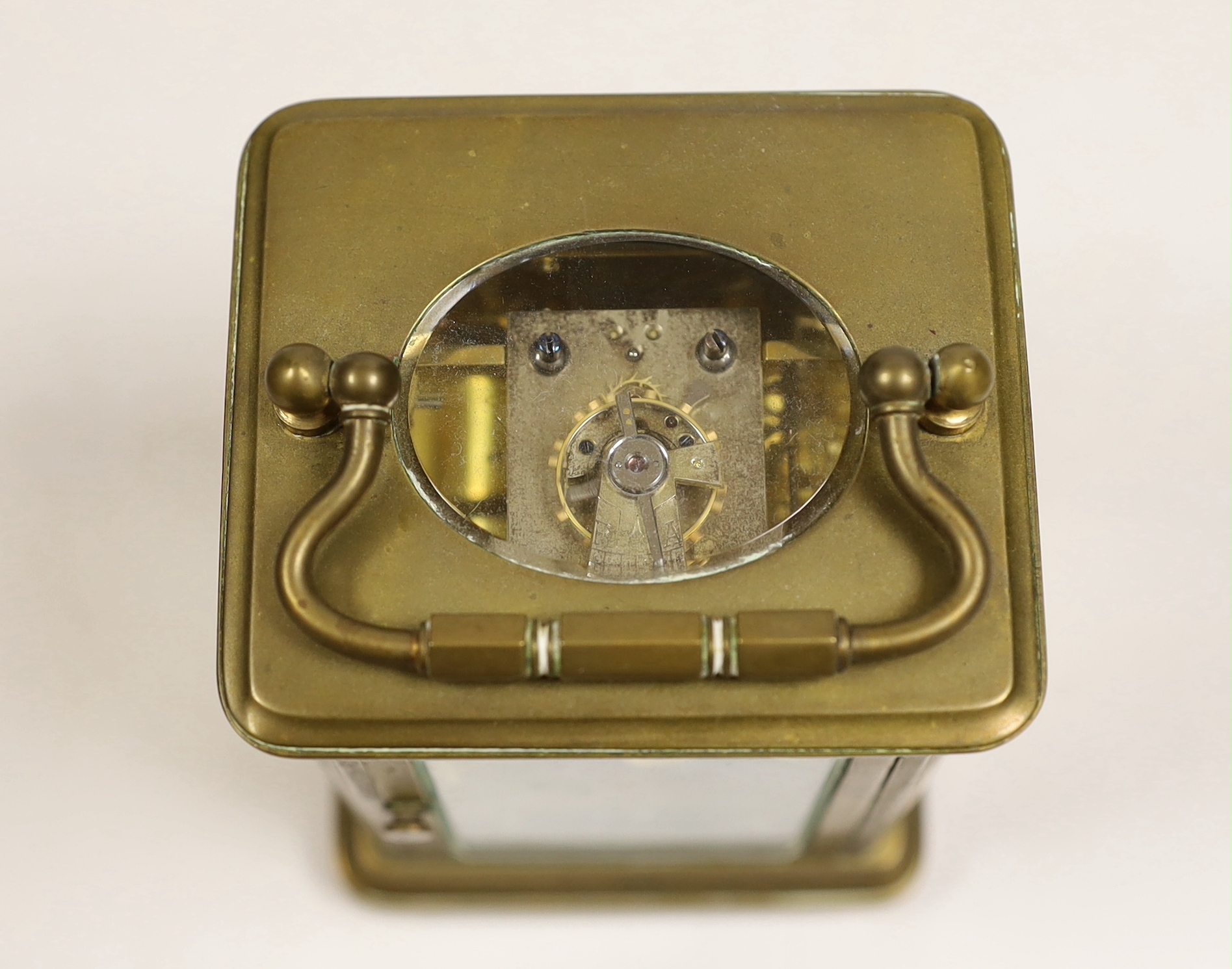 A brass carriage timepiece with travelling case, 11cm